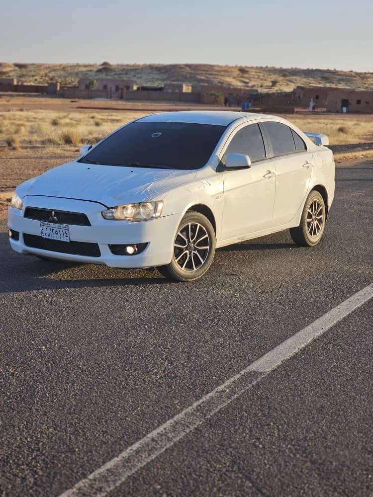 عربية لانسر
موديل 2014